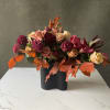 Stunning black callas, dahlias and garden roses.
