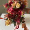 Stunning black callas, dahlias and garden roses.
