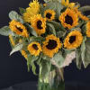 Hydrangeas rurrounded by stunning small, medium and large sunflowers.
 A total of