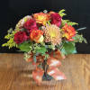 Reminiscent of a cool crisp autumn morning , this arrangement will bring