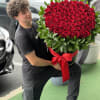 A handcrafted arrangement designed with fresh seasonal blooms, created to bring elegance