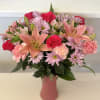 That sweet lady in your life will love this flower arrangement in