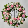 This 18&quot; Wreath includes Pink or Peach Berries, White Rice Flower, Light