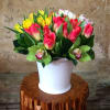 40 stems mix color Tulips, Cymbidium Orchid, and green leaves.