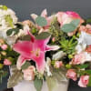 THIS WHIMSY GARDEN FLORAL IN HIGHLIGHTED IN PINKS AND WHITE WITH A