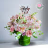 Recipe: Light pink spray roses, gerbera daisies, stock, mini carnations, and more.