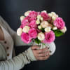 Delight in the beauty of soft pink roses and garden spray roses