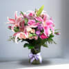 Recipe: Stargazer Lilies, Roses, Spray Roses, Ranuculus (seasonal), Pink Tulips, Stock and