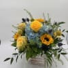 Blue Hydrangea, Yellow Roses, Sunflowers, Craspedia, Thistle and Mixed Greens
