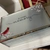 Remember a life beautifully lived with this keepsake jewelry box. Featuring a