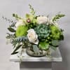 This Low and Lush Modern Arrangement Includes Green Hypericum Berries, White Snapdragons