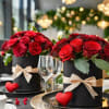 Capturing love in every petal.  Red roses in sleek black hatboxes