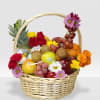 Fuit basket with some fresh cut flowers 
(Fresh cut flowers may vary
