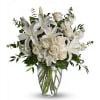A comforting bouquet that offers solace and strength, this arrangement of white
