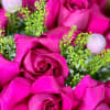 The hot pink roses would captivate attention with their bold color and