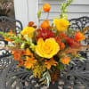 Soft fall colors nestle between wheat and lanterns designed tasteful and low