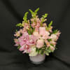 A Fabulous mix of Hydrangea, roses and cymbidium blooms.  Hand Designed