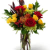 Rich roses and berries in autumn&rsquo;s reds, oranges, and yellows, perfectly styled