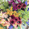 A bountiful and plentiful  bouquet showcasing seasonal colors of autumn like