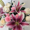 Emanating an aura of timeless elegance and delicate beauty, our exquisite arrangement