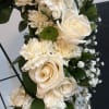 An all white tribute, this heart shaped easel shows your everlasting love.