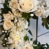 An all white tribute, this heart shaped easel shows your everlasting love.
