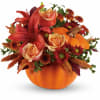 Fall in love with this charming arrangement. Roses, lilies, button spray chrysanthemums