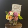 A bowl of roses sent with a sweet wooden keepsake block that