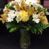 A gorgeous Autumn themed bouquet is sure to brighten up a room.