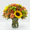 Say hello to autumn with this bouquet filled with bold harvest hues
