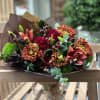 Fall seasonal color scheme mixed flower wrapped bouquet (flowers may vary depending
