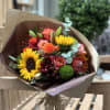 Assorted Fall flowers and autumnal color scheme wrapped bouquet (subject to flower