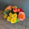 Bursting with color, this cheerful, vibrant mix of blossoms is perfect for