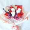 6 red, 6 white preserved roses in bouquet mixed with fillers