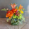 Warm anyone&#039;s heart with this beautiful mix of roses, lilies and other
