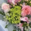 This arrangement consists of pink elements to win over any heart. It