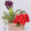 Cala Lilies, roses, ceramic container