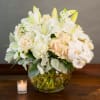 CREAM ROSES, WHITE LILIES, HYDRANGEAS, PHALAENOPSIS ORCHIDS,
DUSTY MILLER  IN A LARGE