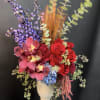 Designed in a timeless vessel, this arrangement is a statement piece&mdash;sophisticated, emotive