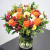 Amazing blooms flower bouquet of yellow and orange roses,  including purple