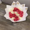 BOUQUET OF BEAUTIFUL PINK AND WHITE ROSES, TULLE AROUND AND CHANEL PAPER