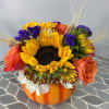 Sunny sunflowers and wheat, rich in purple&#039;s and oranges, arranged in a