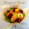 Our designers will choose the freshest fall colored florals to create a