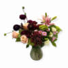 Make a lasting impression with our Burgundy Bliss Vase. This stunning arrangement