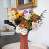 An ode to autumn&rsquo;s golden light, this arrangement glows with warm amber