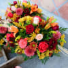 A mix of all favorite flowers like roses, lilies, carnations, daisy, chrysanthemums