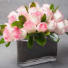 24 Pink and pretty Roses in a contemporary signature design.