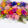 Celebrate mom and brighten up her day with this grand floral gesture