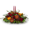 A beautiful arrangement perfect for any fall table. Burgundy candles, mini pumpkins
