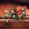 Elevate your autumn gatherings with the Autumn Radiance Centerpiece. A stunning display